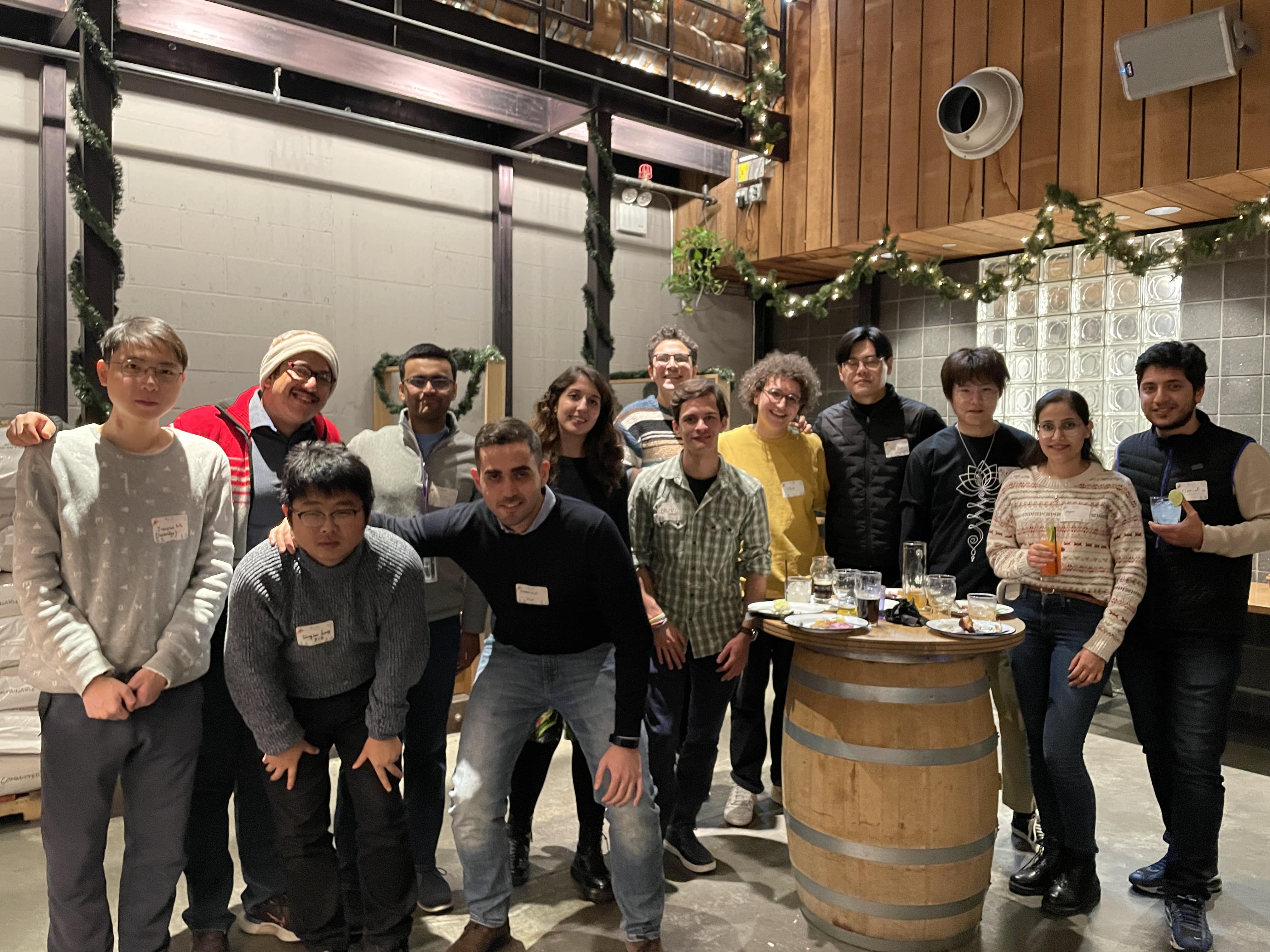 PhD students taking a group photo during the Christmas event